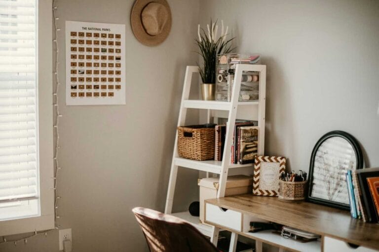 Organized home office with shelves, desk accessories, and natural lighting featured in declutter blogs.